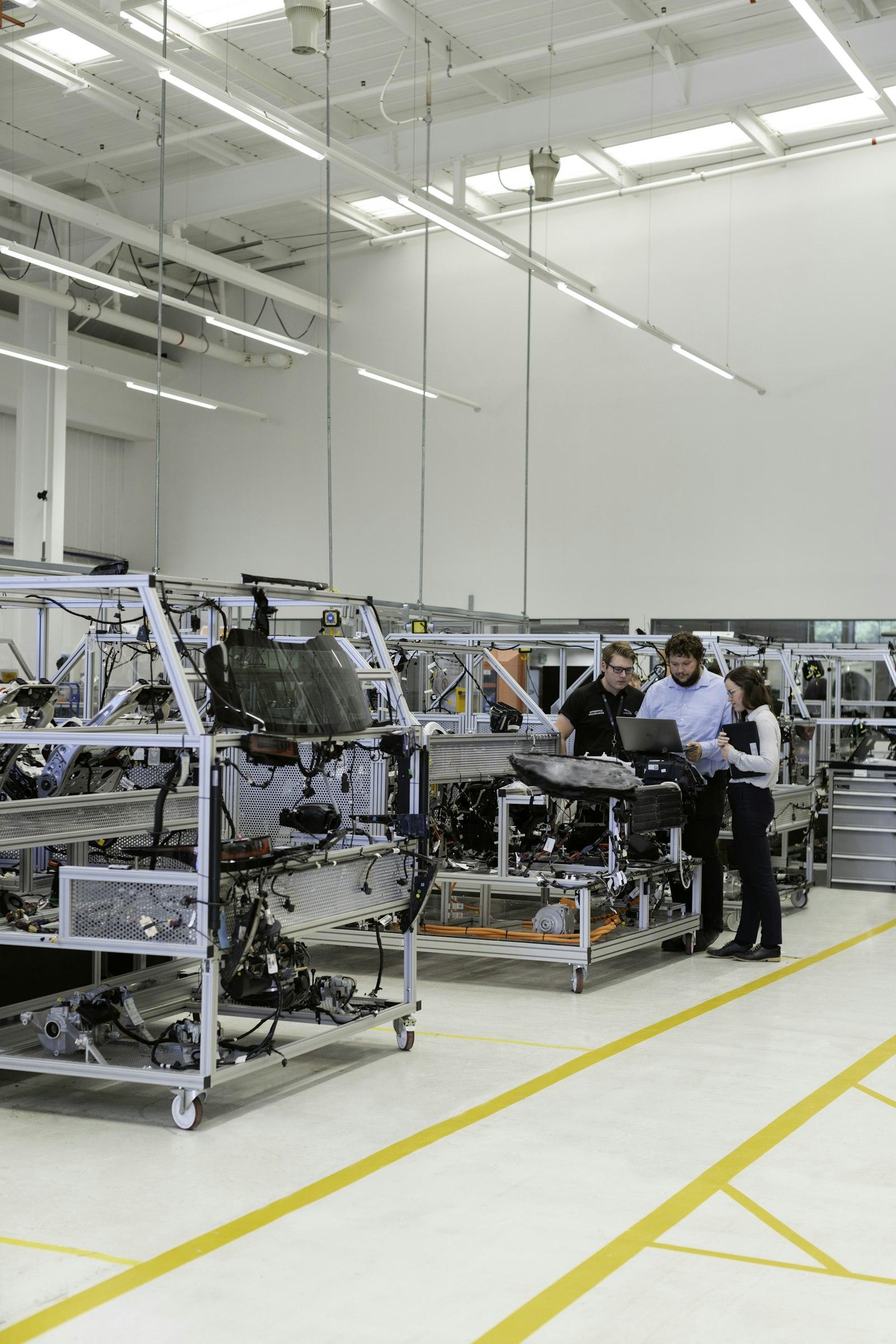 An engineer working on an automated production line